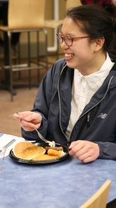 student enjoys late night breakfast