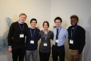 Five Business Students Smiling in a Row
